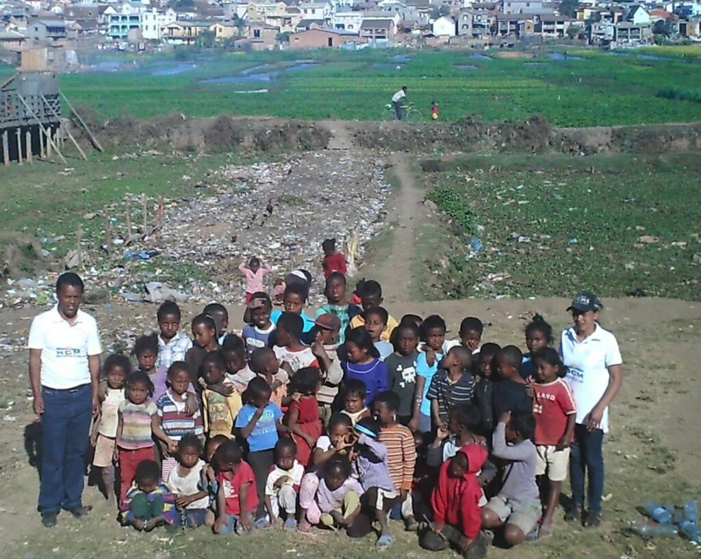 Bible club at garbage dump with BCM leaders -Sahondrah and Rotovohery