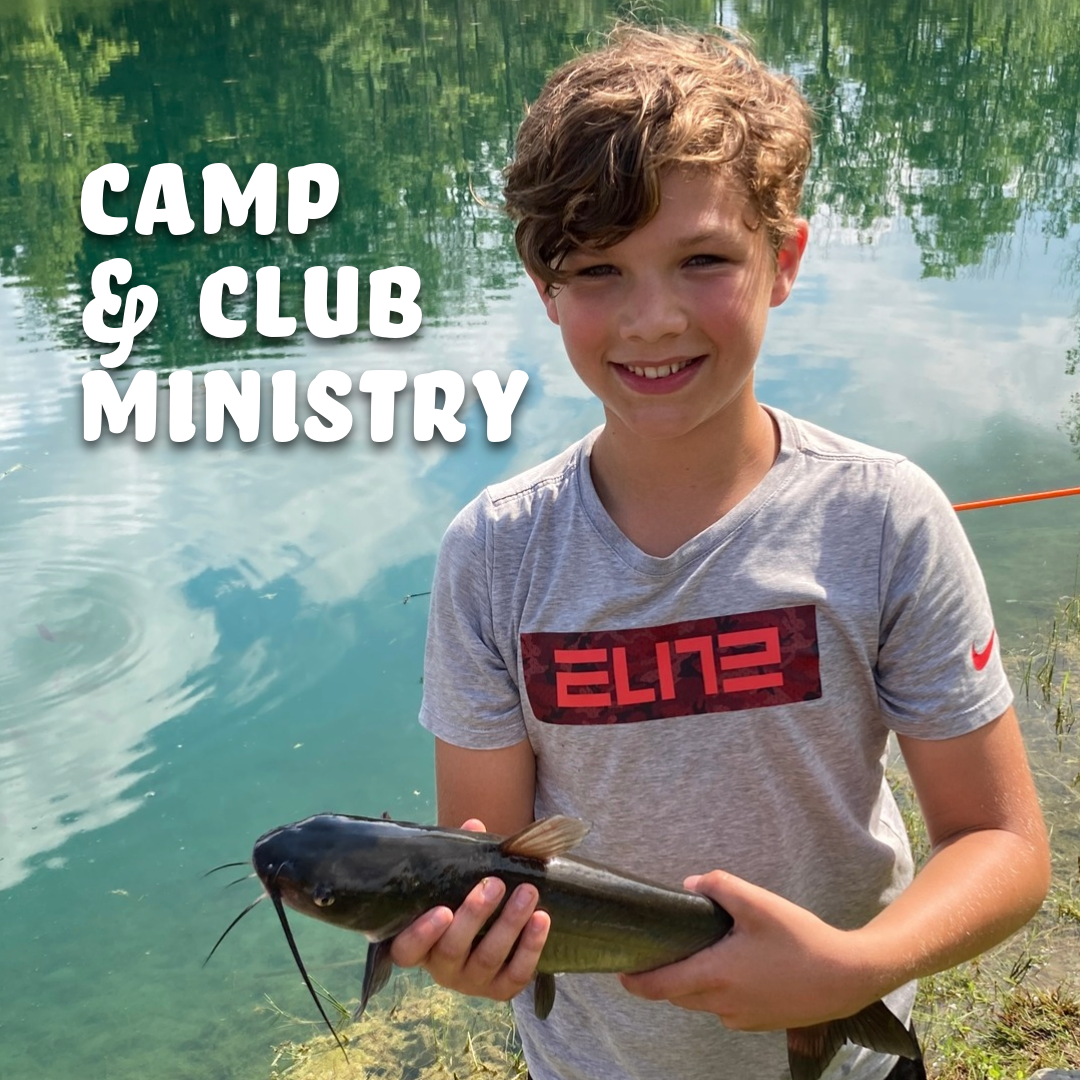 Boy holding fish