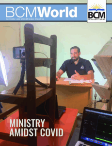 man speaking to a phone camera